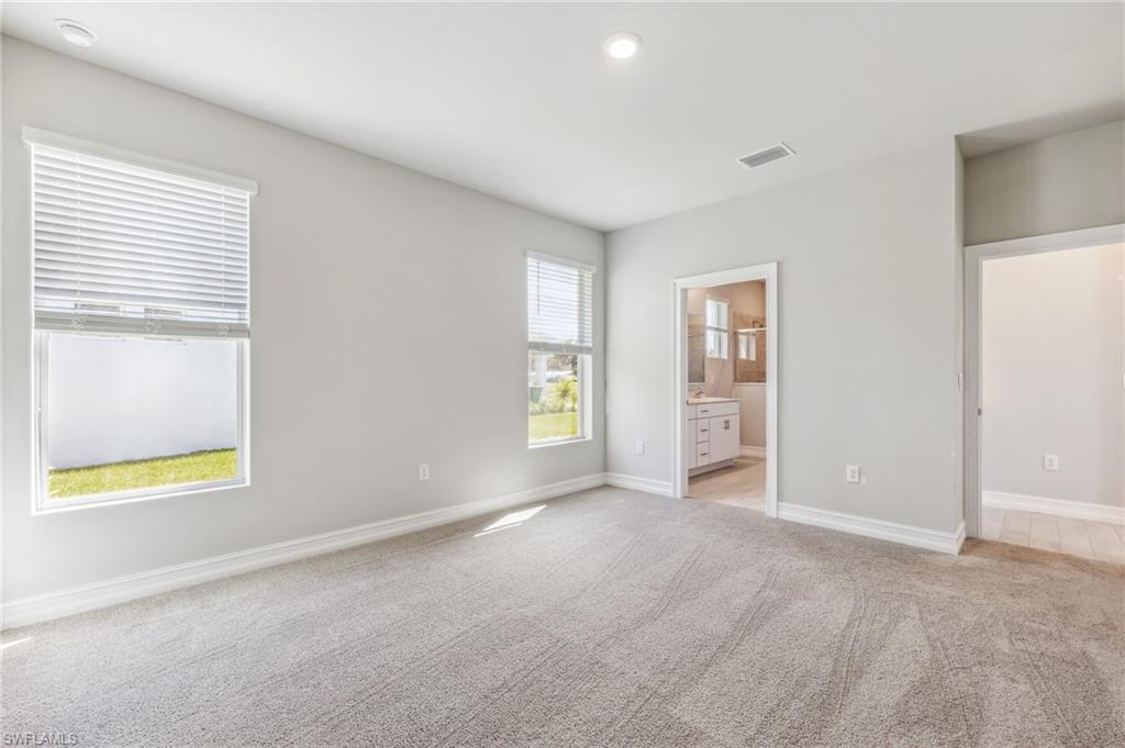 826 Friendship Circle LaBelle, FL 33935 - Photo 14 of 19 a view of an empty room with a window