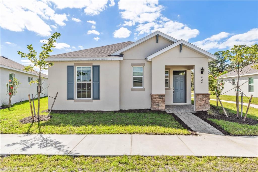 826 Friendship Circle LaBelle, FL 33935 - Photo 3 of 19 a view of a yard in front view of a house