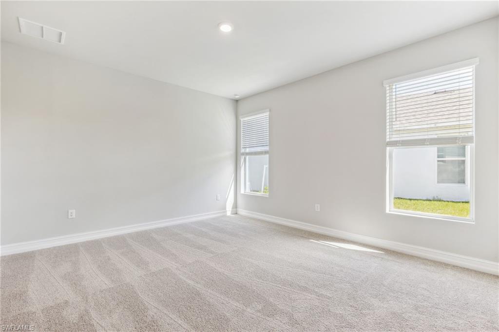 826 Friendship Circle LaBelle, FL 33935 - Photo 6 of 19 a view of an empty room with a window