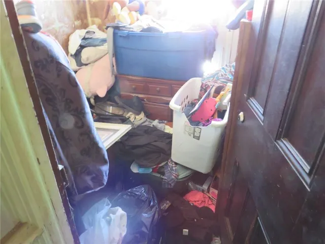 a view of living room with furniture and flowers