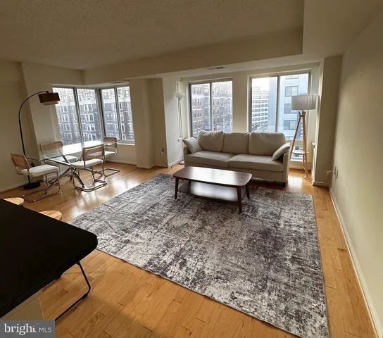 a living room with a couch and a table