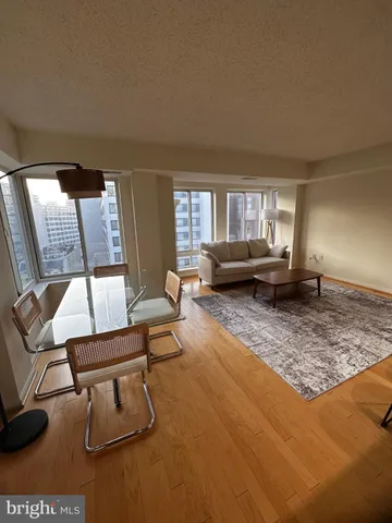 a living room with a couch and a flat screen tv