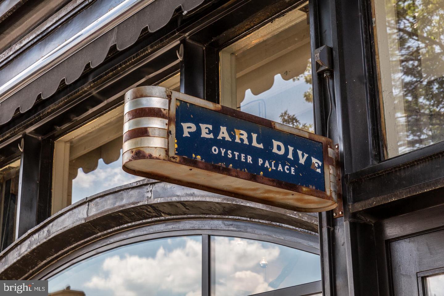 1225 13th Street Northwest, Unit 712 Washington, DC 20005 - Photo 19 of 21 Charming sign of Pearl Dive Oyster Palace