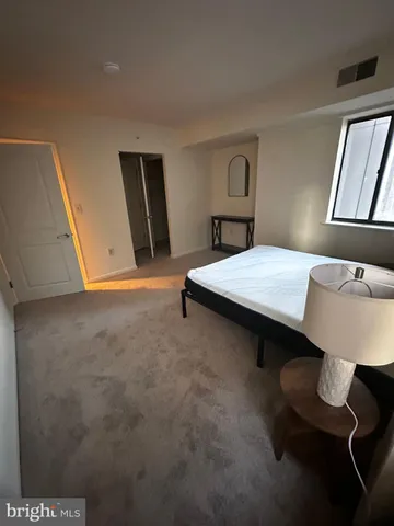 a bathroom with a sink a mirror and a shower