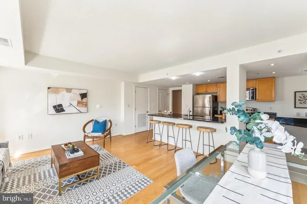 a living room with furniture and a table