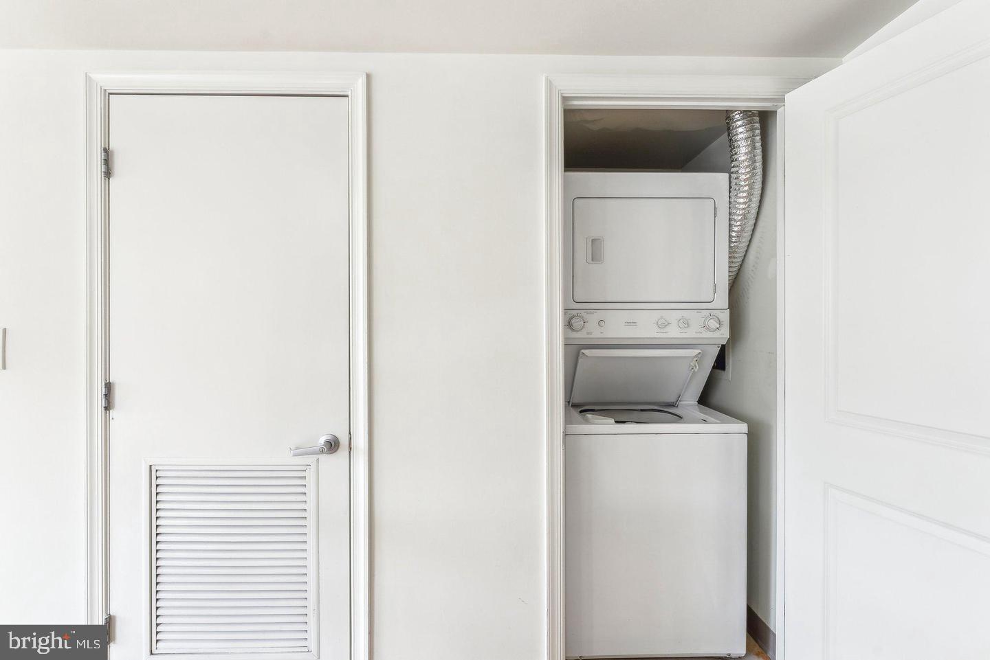 1225 13th Street Northwest, Unit 712 Washington, DC 20005 - Photo 8 of 21 Efficient laundry nook in a modern home.