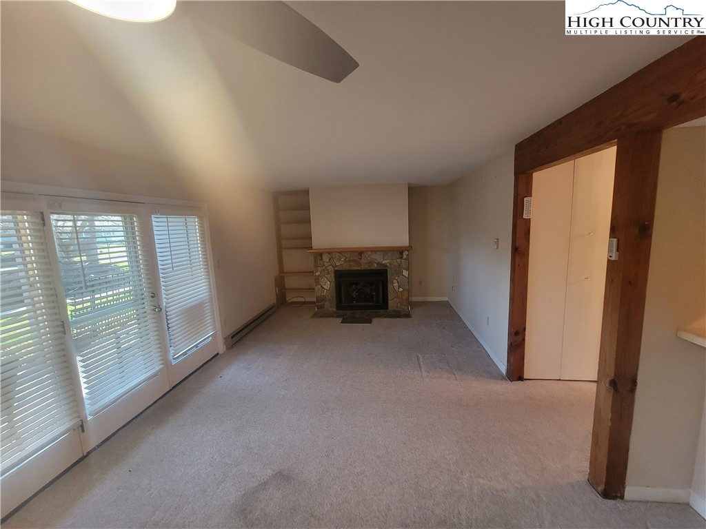 471 Kellwood Drive Extension, Unit 2N1 Boone, NC 28607 - Photo 2 of 6 a view of a livingroom with furniture and staircase