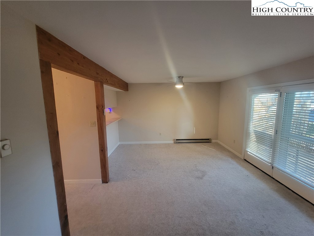 471 Kellwood Drive Extension, Unit 2N1 Boone, NC 28607 - Photo 4 of 6 an empty room with windows