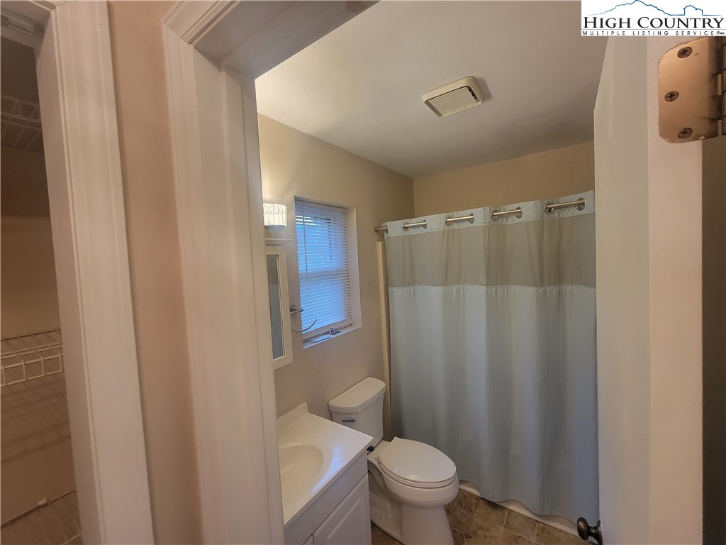 471 Kellwood Drive Extension, Unit 2N1 Boone, NC 28607 - Photo 6 of 6 a bathroom with a shower curtain
