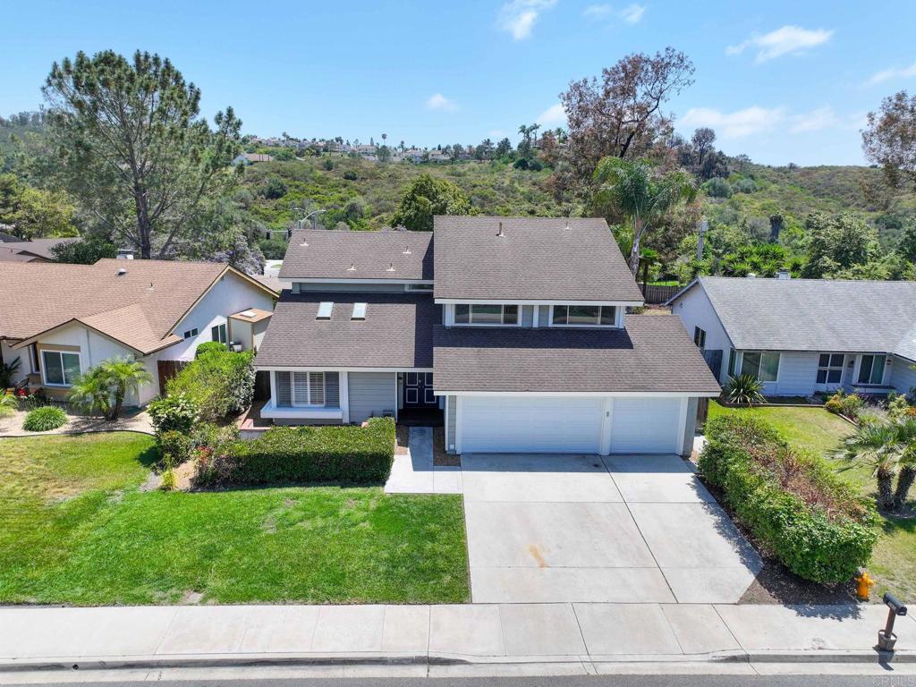4595 Blackwell Road Oceanside, CA 92056 - Photo 44 of 47 a aerial view of a house with a garden and a yard