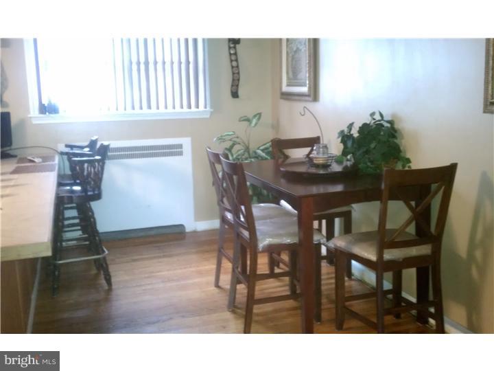 256 Glendale Road Upper Darby, PA 19082 - Photo 6 of 13 a dining room with furniture and wooden floor