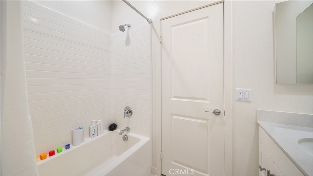 3610 East Pollock Street, Unit 4 Ontario, CA 91761 - Photo 29 of 47 a bathroom with a bathtub and a shower