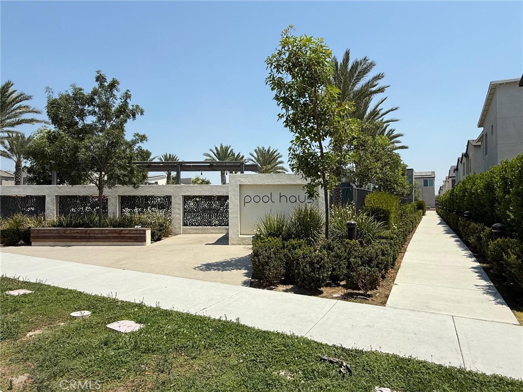 3610 East Pollock Street, Unit 4 Ontario, CA 91761 - Photo 36 of 47 a view of a house with a yard