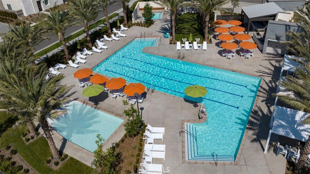 3610 East Pollock Street, Unit 4 Ontario, CA 91761 - Photo 37 of 47 an aerial view of swimming pool patio and outdoor seating