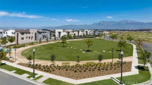 a view of a swimming pool with a yard