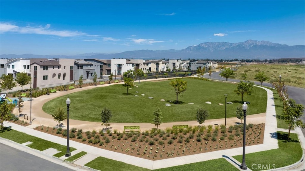 3610 East Pollock Street, Unit 4 Ontario, CA 91761 - Photo 41 of 47 a view of a swimming pool with a yard