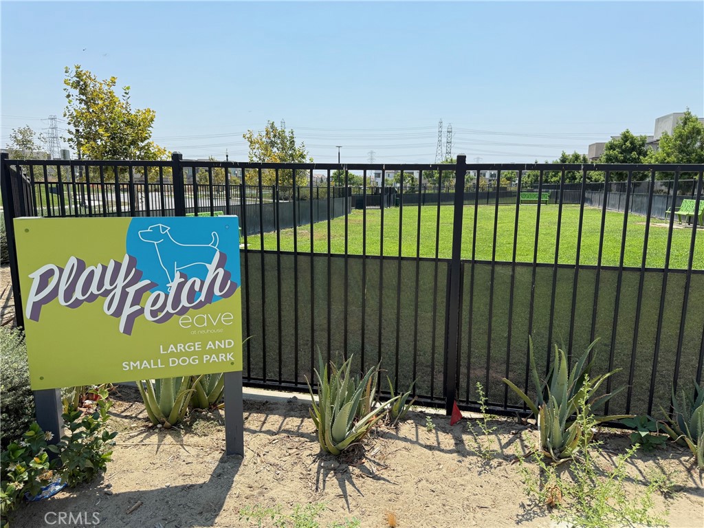 3610 East Pollock Street, Unit 4 Ontario, CA 91761 - Photo 42 of 47 a view of a park with a bench and trees