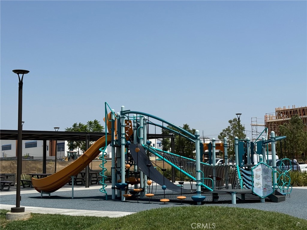 3610 East Pollock Street, Unit 4 Ontario, CA 91761 - Photo 44 of 47 a view of a deck with a big yard and potted plants
