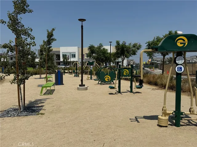 a view of a park with swings