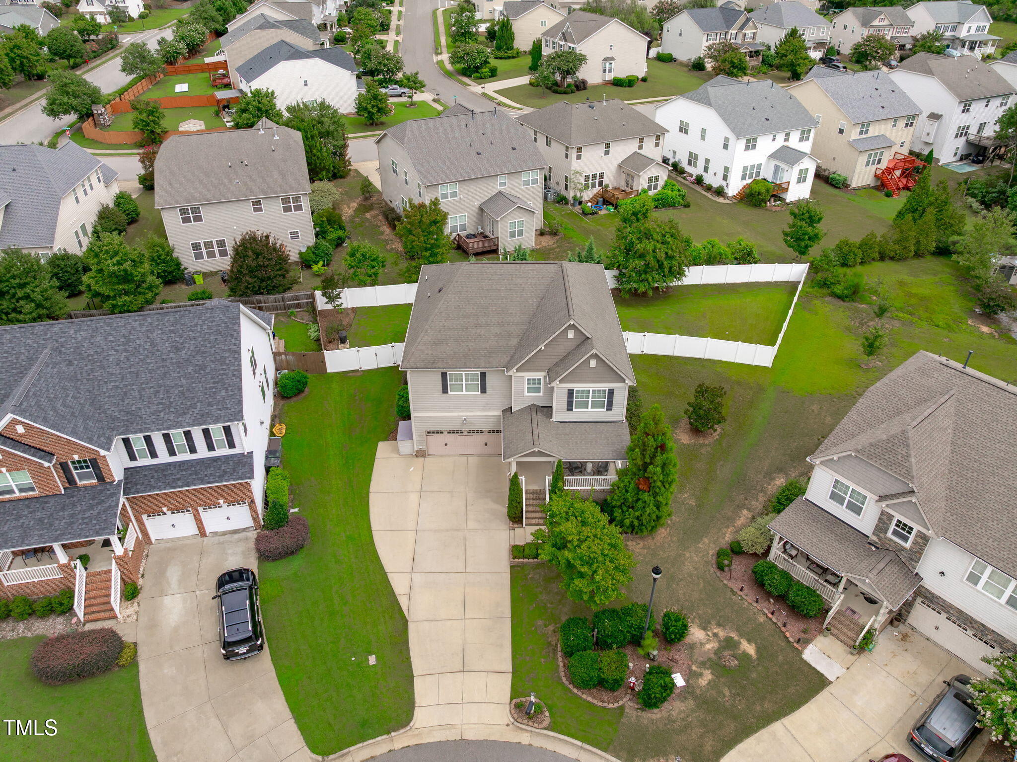 1909 Ferntree Court Morrisville, NC 27560 - Photo 32 of 38 an aerial view of a house with garden space and street view