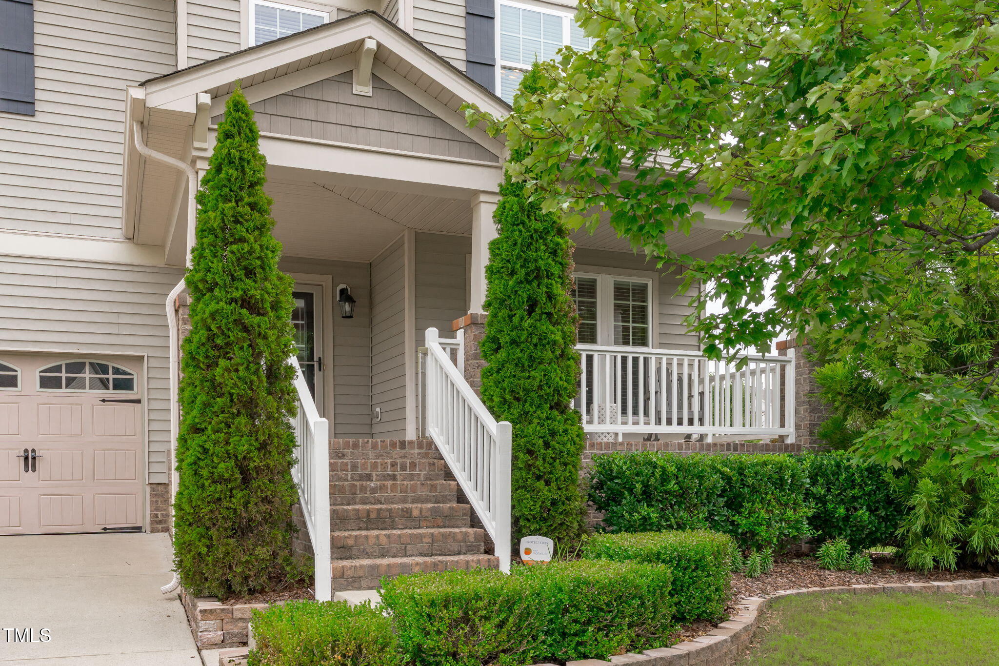 1909 Ferntree Court Morrisville, NC 27560 - Photo 7 of 38 a front view of a house with garden