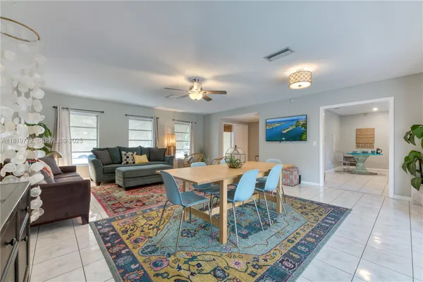 a view of a dining room with furniture