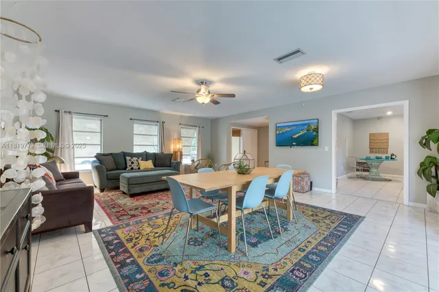 a view of a dining room with furniture