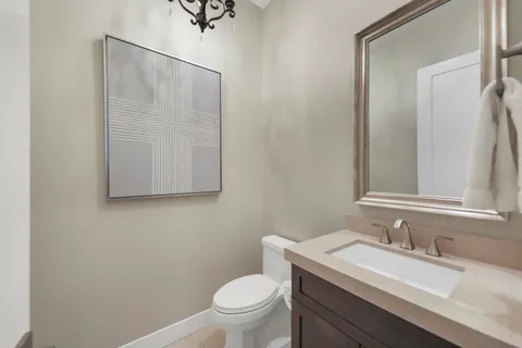 a white bath tub sitting next to a white toilet