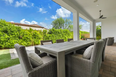 a view of a swimming pool with a patio
