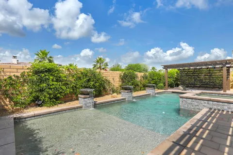 a view of a garden with an outdoor space