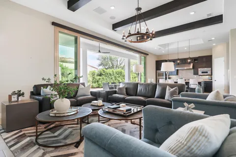 a kitchen with a table and chairs in it