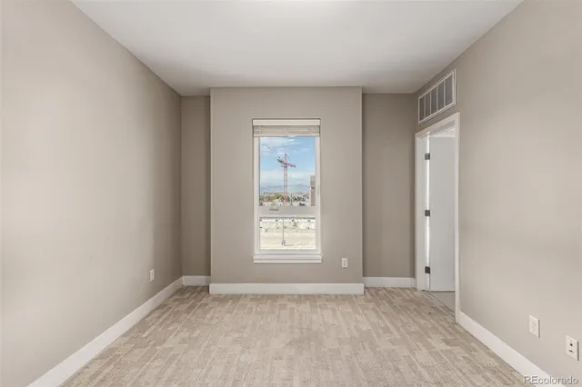 a view of an empty room with window