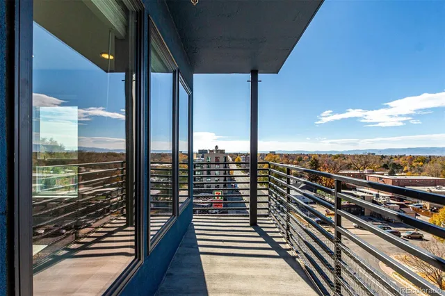 a city view with wooden floor