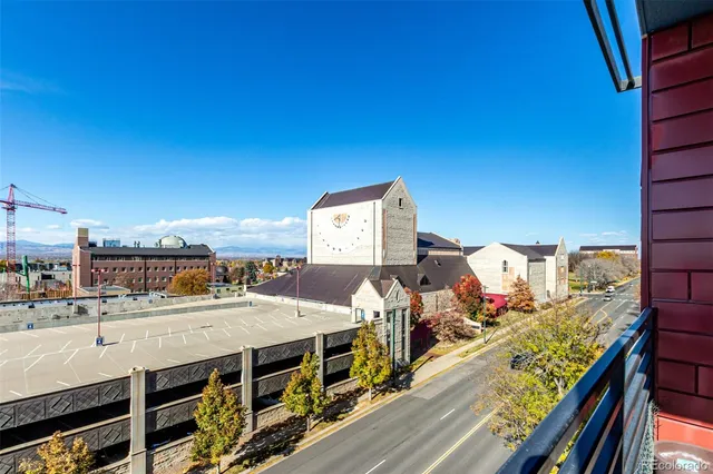 a view of a balcony with two chairs
