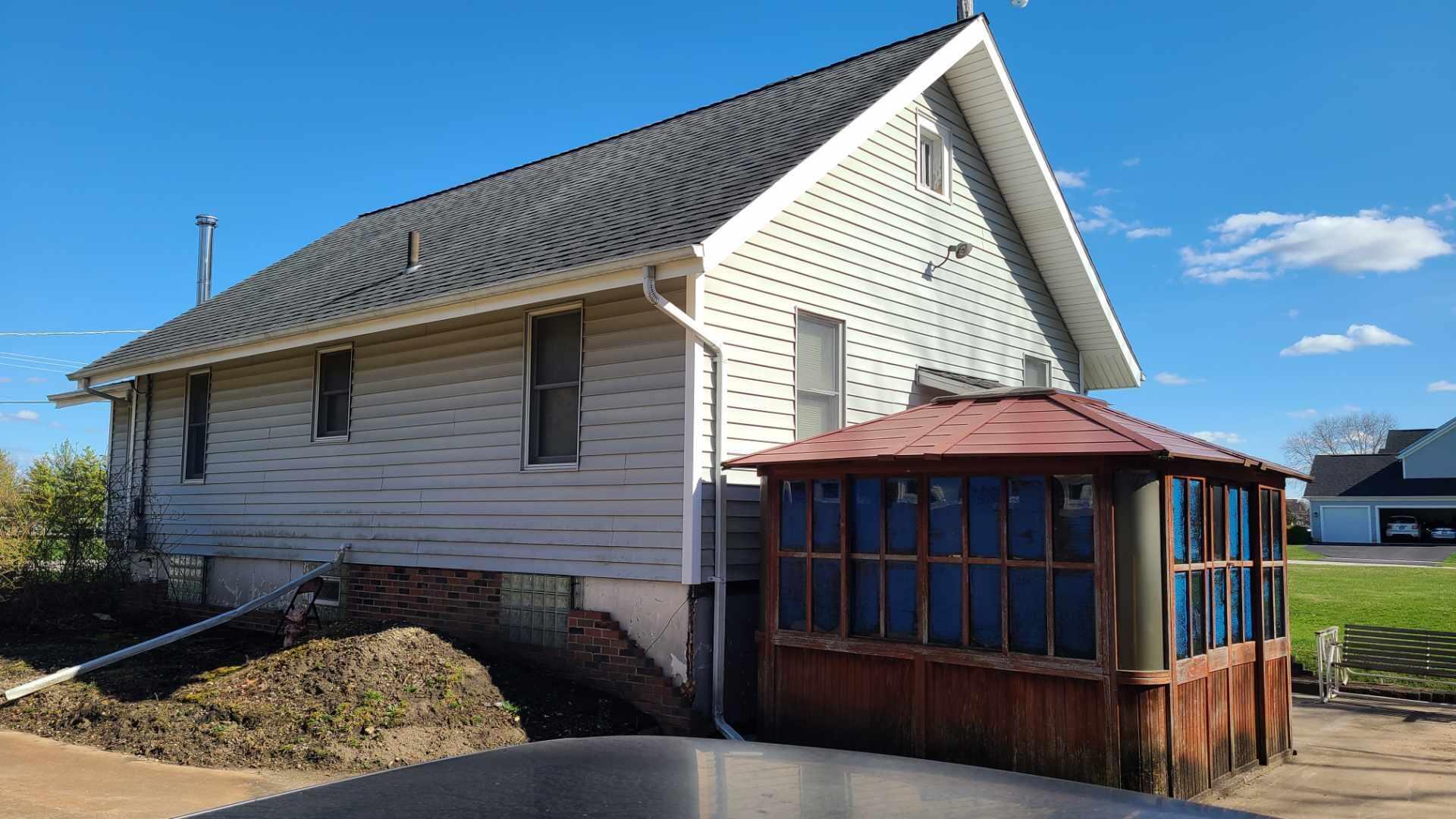 4-n732 Old Lafox Road St. Charles, IL 60175 - Photo 2 of 7 a view of a house with wooden fence