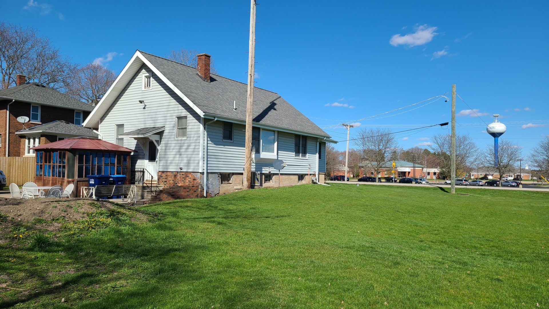 4-n732 Old Lafox Road St. Charles, IL 60175 - Photo 3 of 7 a view of a house with a yard and sitting area