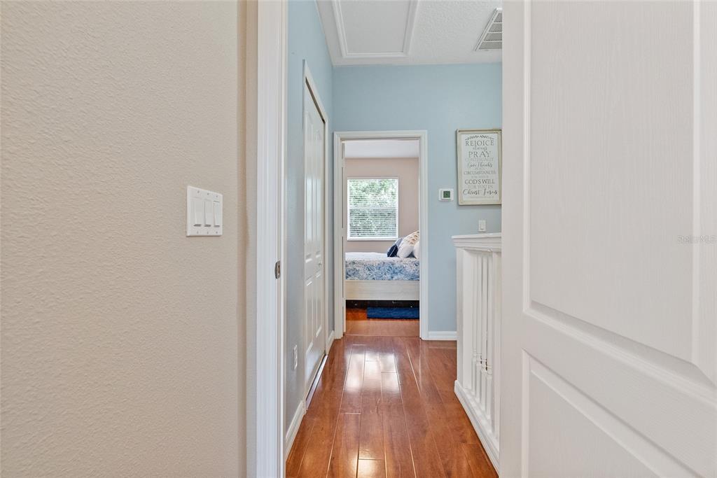 10475 Manderley Way Orlando, FL 32829 - Photo 24 of 31 a view of a bathroom from a hallway
