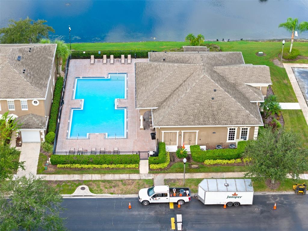 10475 Manderley Way Orlando, FL 32829 - Photo 30 of 31 an aerial view of a house with a garden and lake view