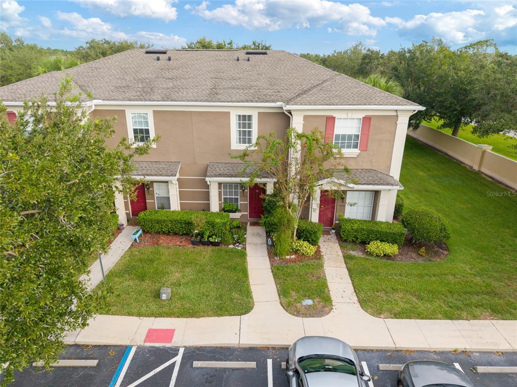10475 Manderley Way Orlando, FL 32829 - Photo 5 of 31 front view of house with a yard