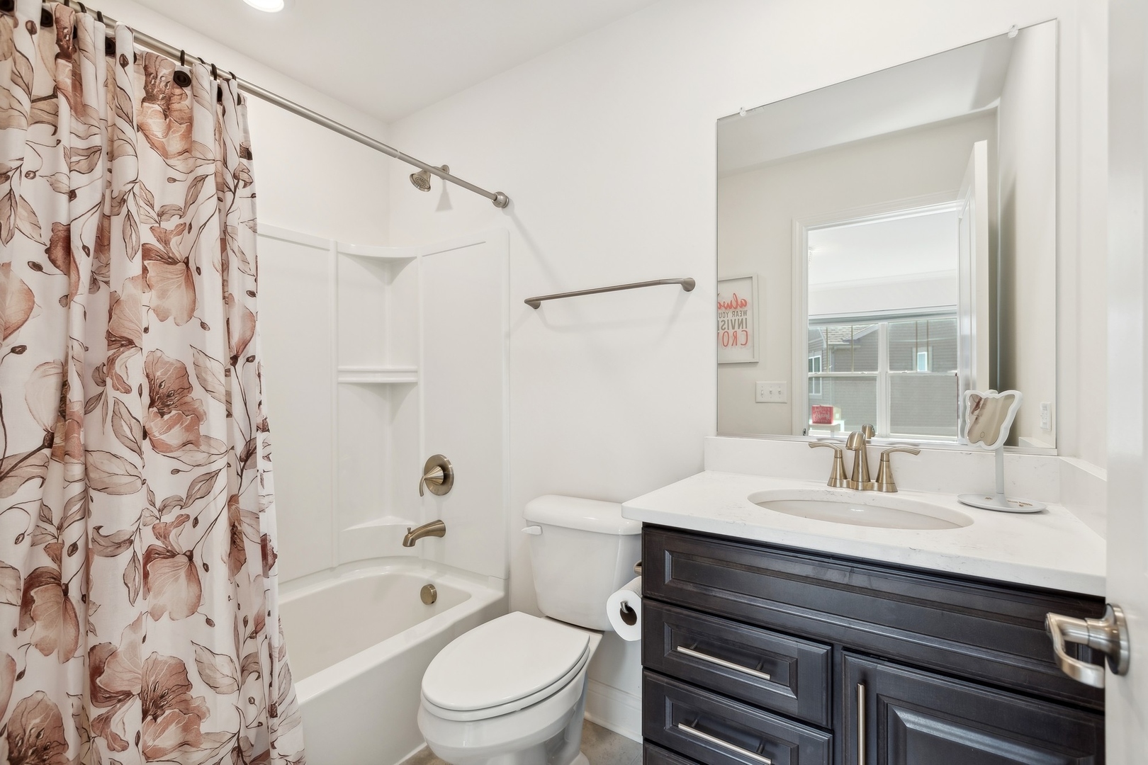 1142 Glengary Court Crystal Lake, IL 60012 - Photo 12 of 24 a bathroom with a sink toilet a mirror and shower