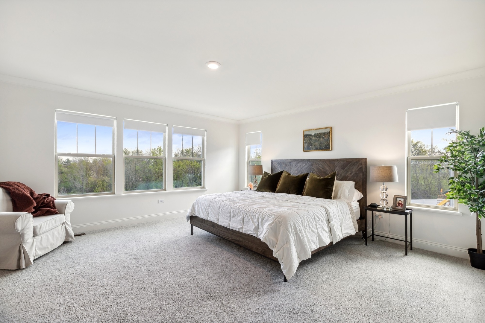 1142 Glengary Court Crystal Lake, IL 60012 - Photo 13 of 24 a spacious bedroom with a bed and a couch