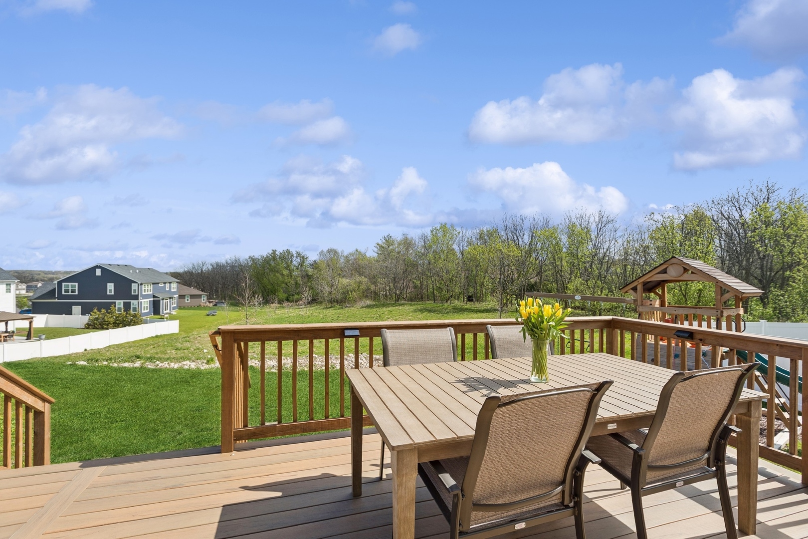 1142 Glengary Court Crystal Lake, IL 60012 - Photo 19 of 24 a view of a city from a balcony with furniture