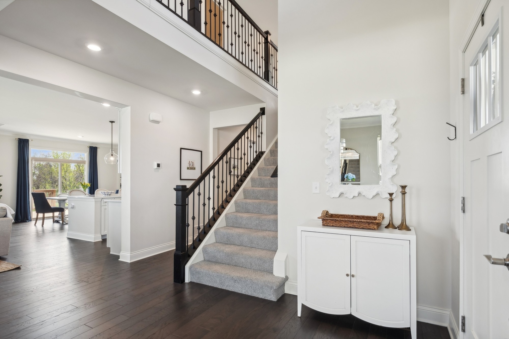 1142 Glengary Court Crystal Lake, IL 60012 - Photo 2 of 24 a hallway with white cabinets and entryway