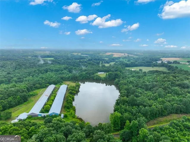 a view of a yard with an outdoor space and seating