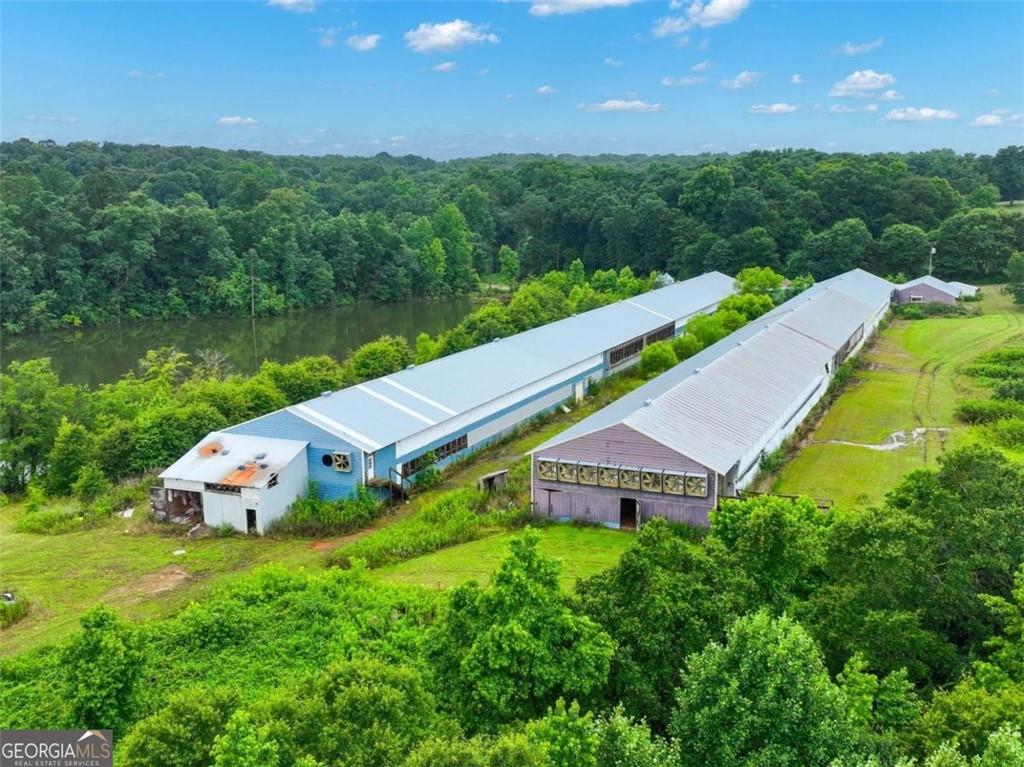 397 Reed Brawner Road Royston, GA 30662 - Photo 30 of 35 aerial view of a house with pool and a yard