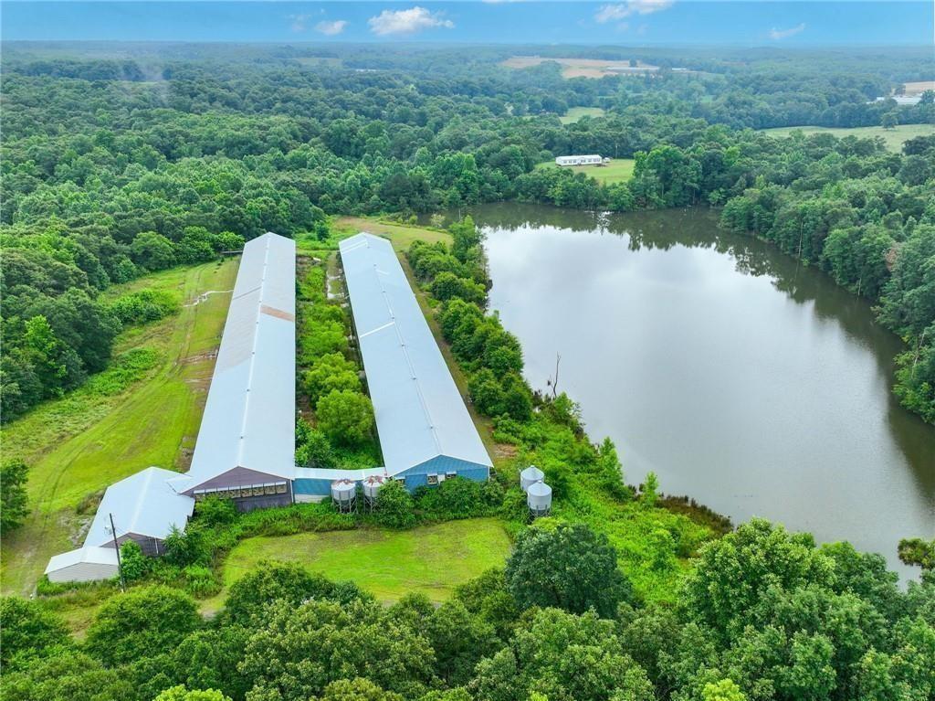 397 Reed Brawner Road Royston, GA 30662 - Photo 31 of 33 an aerial view of a house with a yard and lake view