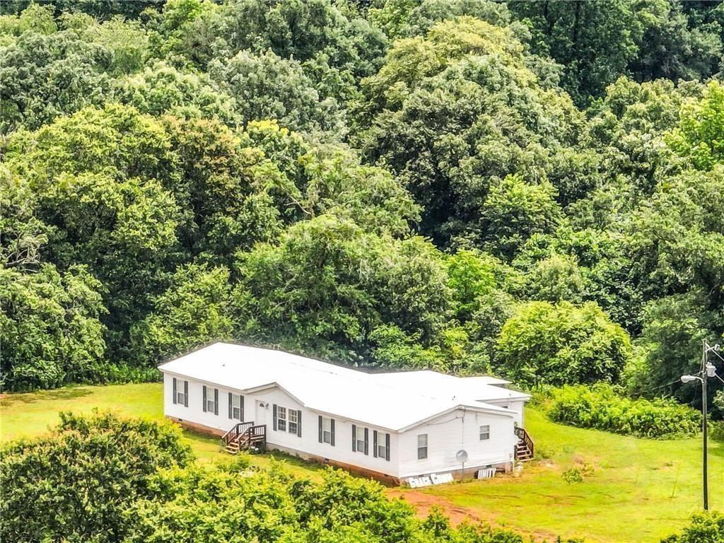 397 Reed Brawner Road Royston, GA 30662 - Photo 4 of 33 a view of a house with a yard and sitting area