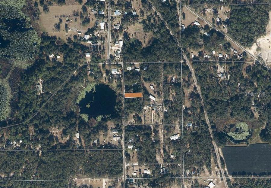 436 Huntington Shortcut Road Pomona Park, FL 32181 - Photo 2 of 3 a bird view of house and outdoor space