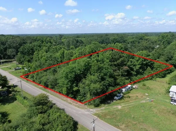a view of a garden with a outdoor space