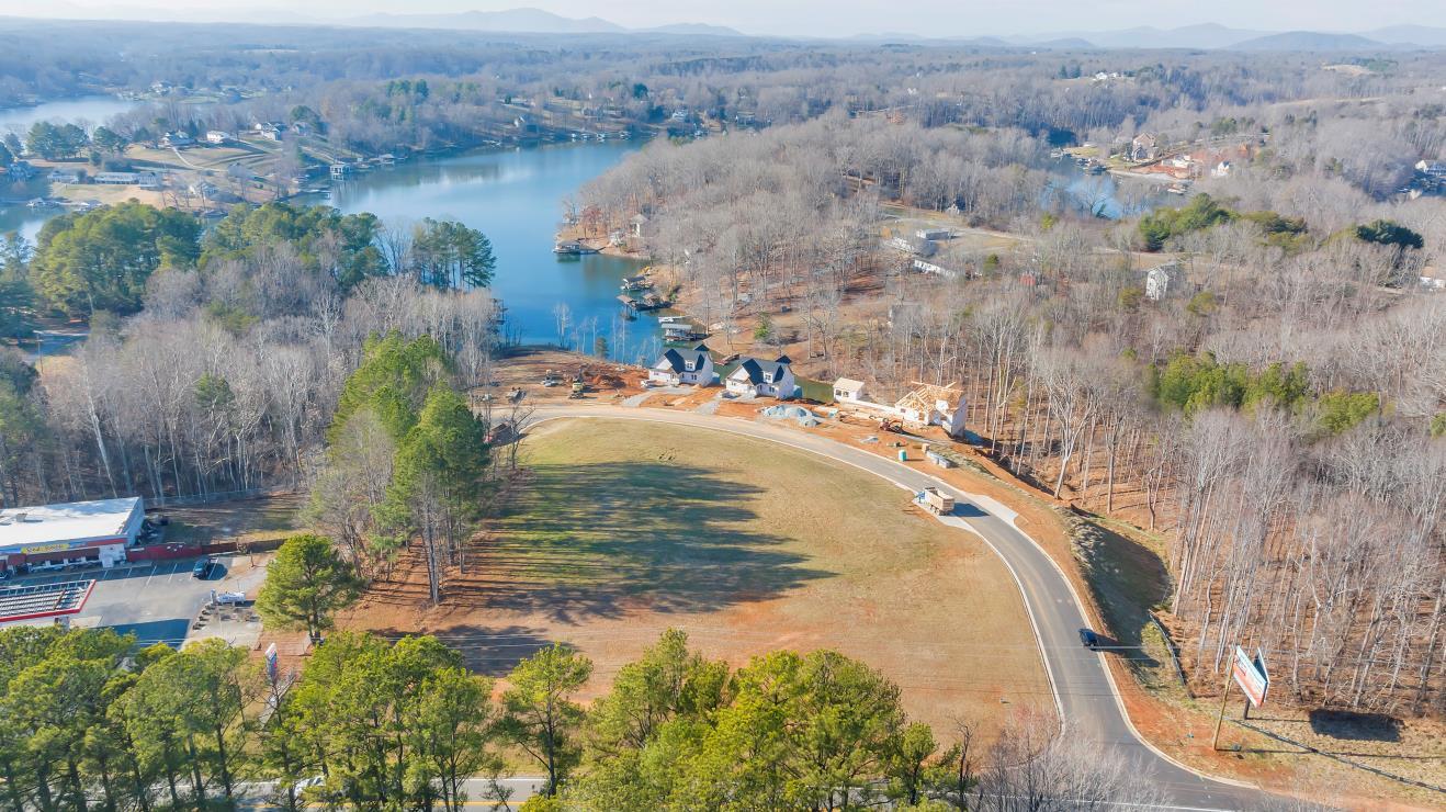 Lot 9 Moneta Road Moneta, VA 24121 - Photo 6 of 6 an aerial view of a house with a yard and lake view